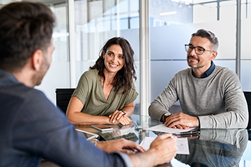 A couple meeting with an advisor